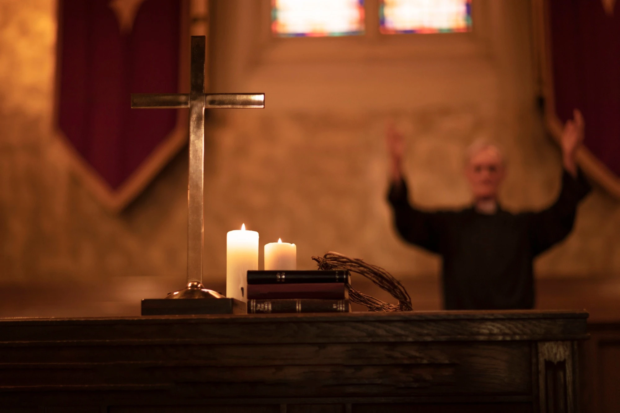 priest-praying-church_23-2149316007